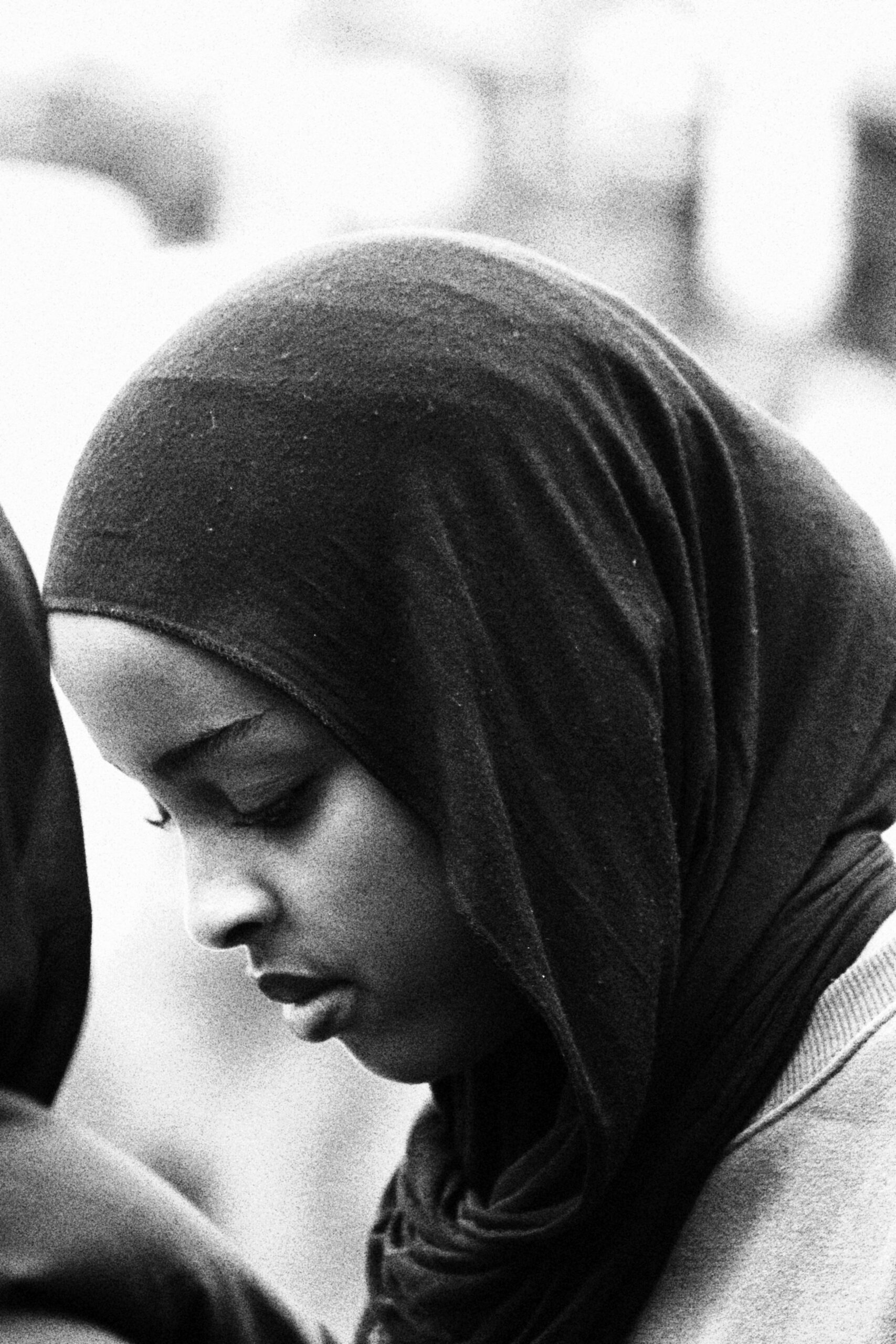 Portrait taken by Chicago based photographer Anthony Z. Royster in London, United Kingdom. Photography is of a woman of Muslim culture, The thoughts of the moment could amount to any topic yet the expression she has only says the answer is near with patience.  